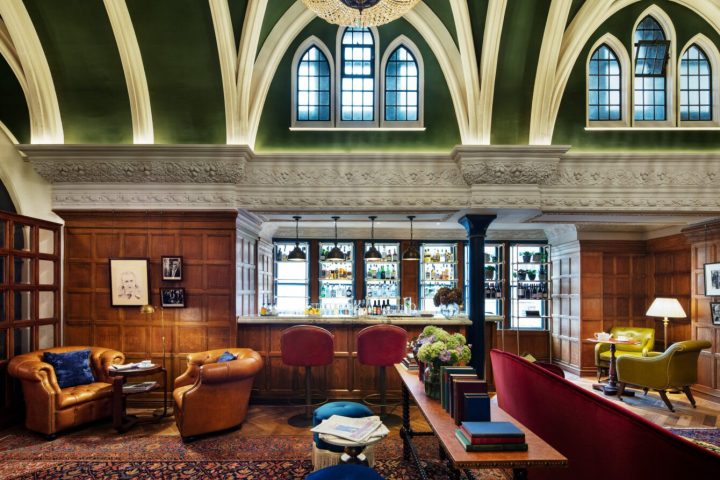 a room filled with furniture and a large window