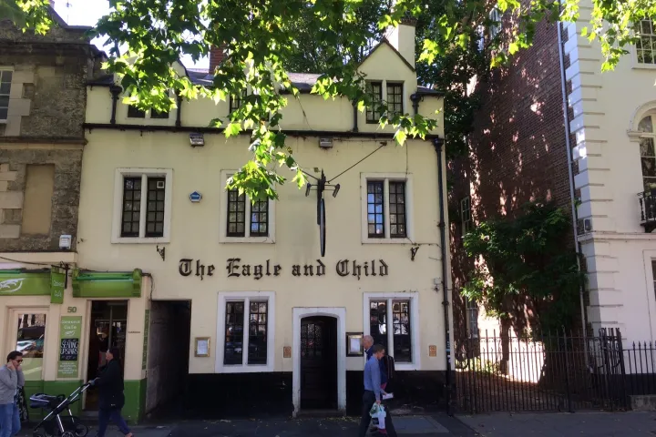 a group of people in front of a building