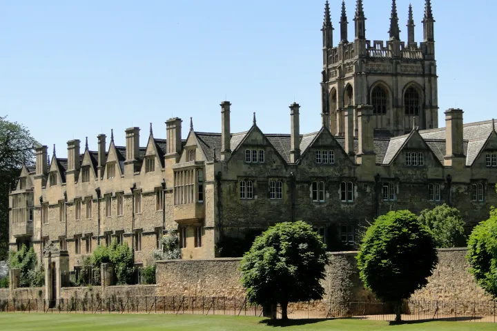 a large clock tower in front of a building