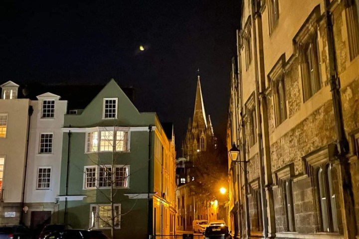 a city street in front of a building