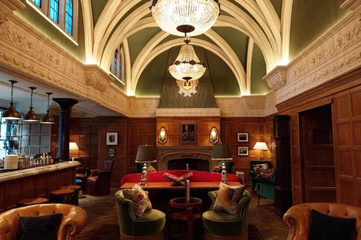 a room filled with furniture and a large window