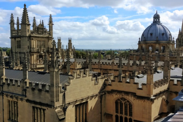a large clock tower towering over a city